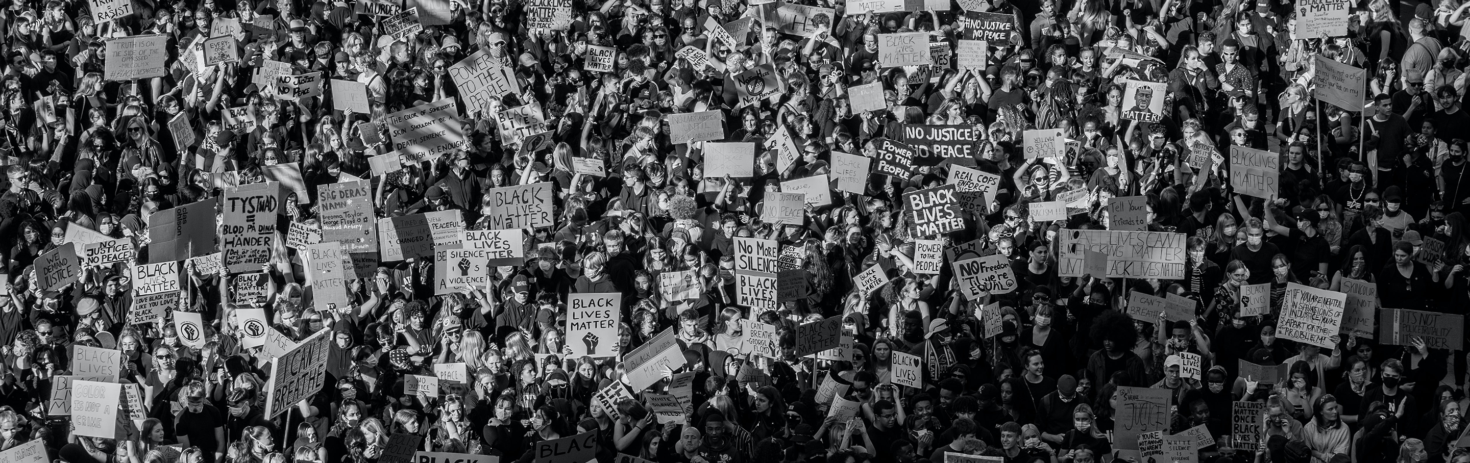 huge crowds with Black Lives Matter signs.