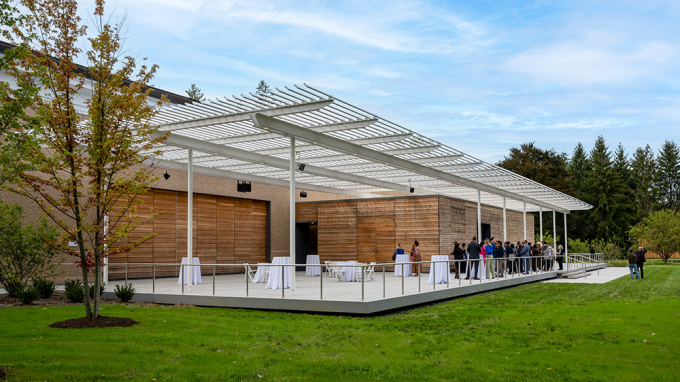 the back of the David Rockefeller Creative arts center, set with bar and tables 
