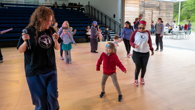 Families and children dance with the Dream Dance Studio