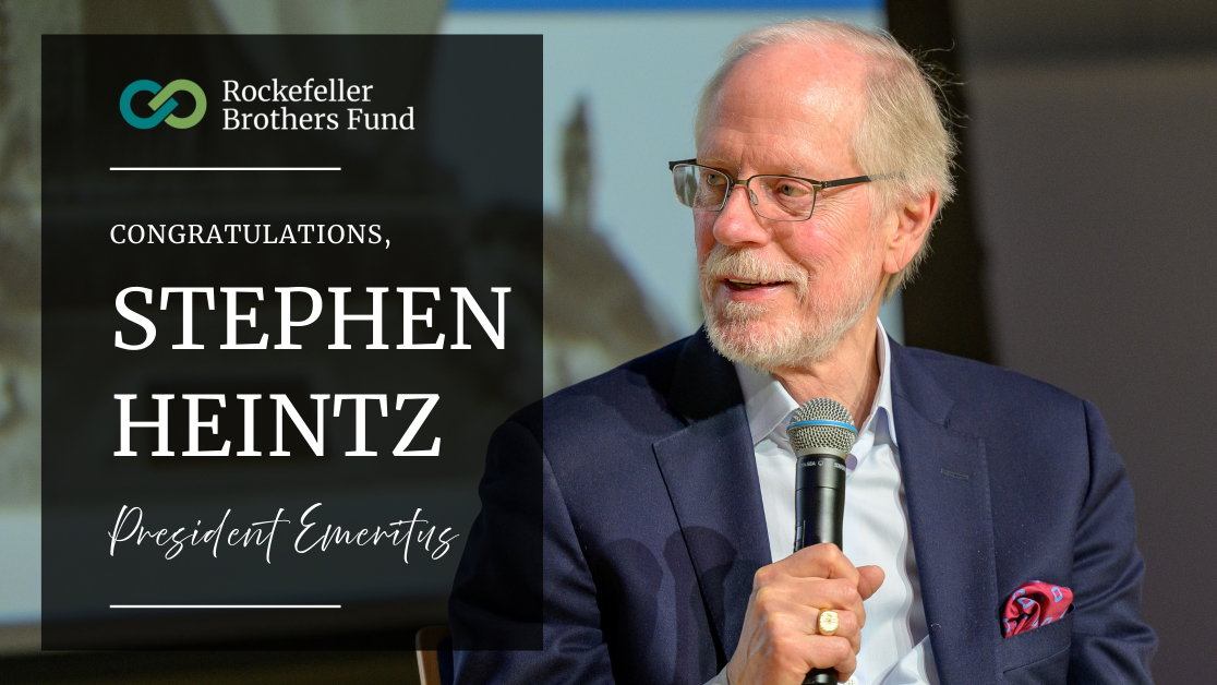 A portrait of Stephen Heintz holding a microphone with the text, "congratulations Stephen heintz, President Emeritus of the Rockefeller Brothers Fund"