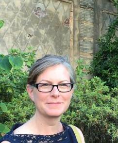 Woman with glasses outdoors