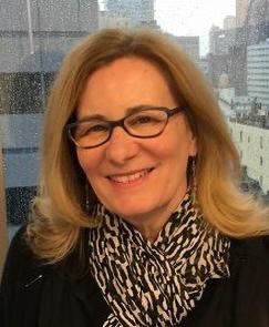 Headshot of woman with glasses