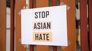 A sign that reads "STOP ASIAN HATE"