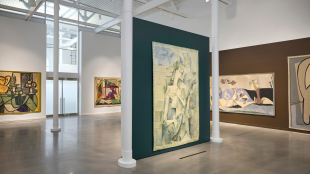 Wide view of the Woven Wonders: Kykuit’s Picasso Tapestries exhibition at the David Rockefeller Creative Arts Center, featuring several large handwoven tapestries based on Pablo Picasso’s artworks displayed throughout a spacious gallery.
