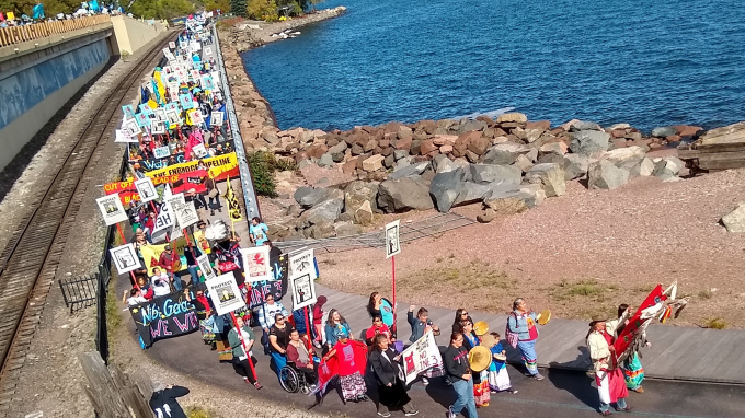indigenous-led protest march along the banks of Lake Superior