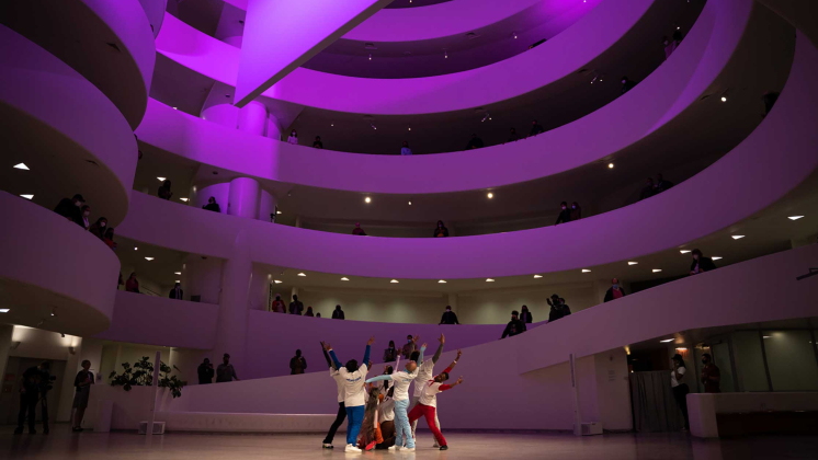 dancers perform in the guggenheim rotunda